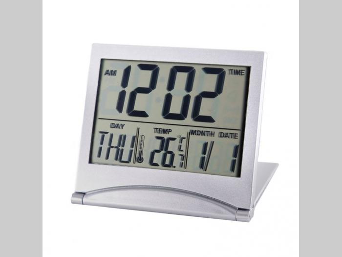 sat alarm sa termometrom i kalendarom koji pokazuje datum ,mesec i dan u nedelji kada se sklopi postaje putni sat pa lako mezete poneti ovaj sat ukoliko ste negde na drugom mestu poslovno da negledate besplatni mali oglasi